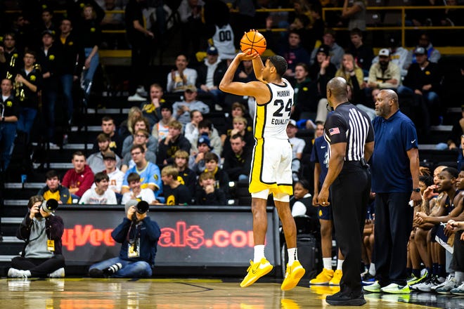Iowa forward Kris Murray makes a 3-point basket during a NCAA men's basketball game against North Carolina A&T, Friday, Nov. 11, 2022, at Carver-Hawkeye Arena in Iowa City, Iowa.
