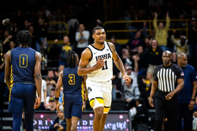 Iowa guard Tony Perkins (11) reacts after making a basket during a NCAA men's basketball game against North Carolina A&T, Friday, Nov. 11, 2022, at Carver-Hawkeye Arena in Iowa City, Iowa.