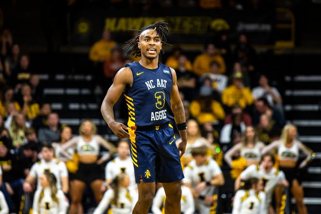 North Carolina A&T guard Kam Woods (3) celebrates after making a basket during a NCAA men's basketball game against Iowa, Friday, Nov. 11, 2022, at Carver-Hawkeye Arena in Iowa City, Iowa.