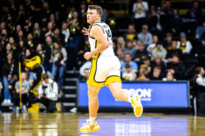 Iowa guard Carter Kingsbury reacts after making a 3-point basket during a NCAA men's basketball game against North Carolina A&T, Friday, Nov. 11, 2022, at Carver-Hawkeye Arena in Iowa City, Iowa.