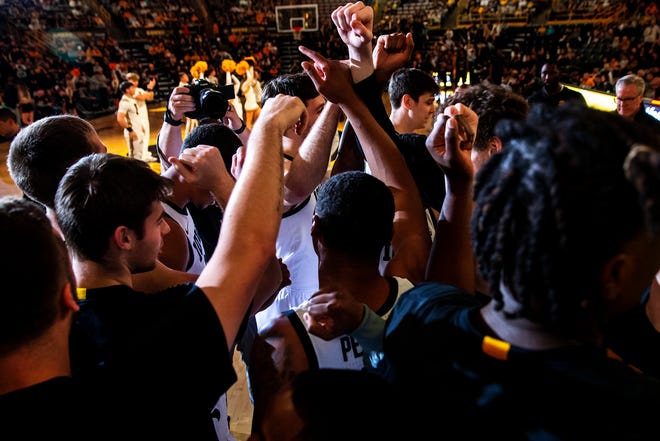 Iowa Hawkeyes players huddle up before a NCAA men's basketball game against North Carolina A&T, Friday, Nov. 11, 2022, at Carver-Hawkeye Arena in Iowa City, Iowa.