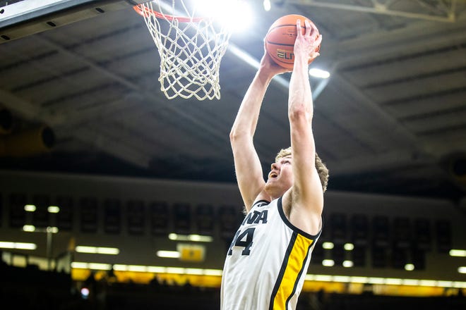 Iowa forward Riley Mulvey dunks the ball during a NCAA men's basketball game against North Carolina A&T, Friday, Nov. 11, 2022, at Carver-Hawkeye Arena in Iowa City, Iowa.