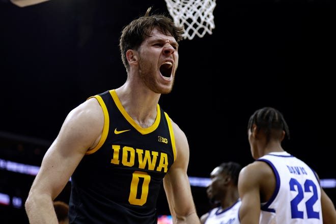 Iowa forward Filip Rebraca (0) reacts after making a basket against Seton Hall during the first half of an NCAA college basketball game, Wednesday, Nov. 16, 2022, at the Prudential Center in Newark, N.J.