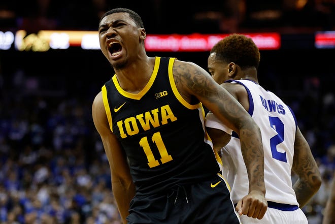 Iowa guard Tony Perkins reacts after making a basket against Seton Hall during the first half of an NCAA college basketball game Wednesday, Nov. 16, 2022, at the Prudential Center in Newark, N.J.