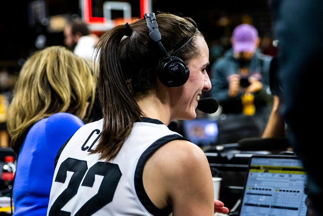 Iowa guard Caitlin Clark (22) smiles while doing a postgame interview after a Cy-Hawk Series NCAA women's basketball game against Iowa State, Wednesday, Dec. 7, 2022, at Carver-Hawkeye Arena in Iowa City, Iowa.