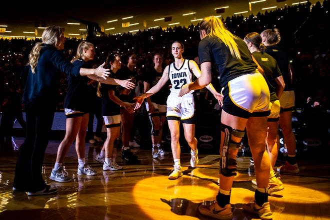 Iowa guard Caitlin Clark (22) is introduced during a Cy-Hawk Series NCAA women's basketball game against Iowa State, Wednesday, Dec. 7, 2022, at Carver-Hawkeye Arena in Iowa City, Iowa.