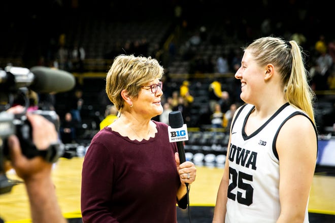 Iowa center Monika Czinano (25) is interviewed by Brenda VanLengen on Big Ten Network after a NCAA Big Ten Conference women's basketball game against Purdue, Thursday, Dec. 29, 2022, at Carver-Hawkeye Arena in Iowa City, Iowa.