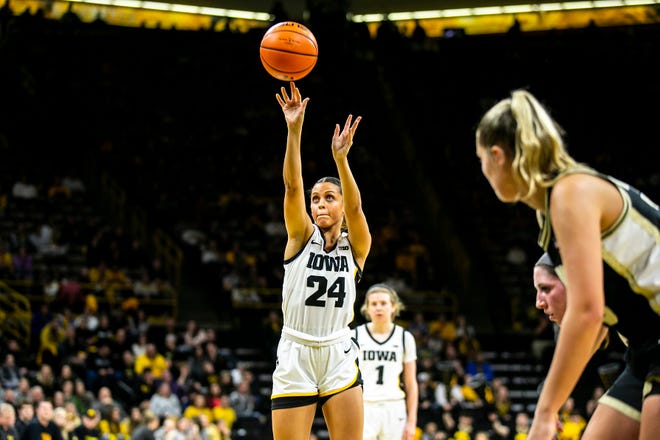 Iowa guard Gabbie Marshall (24) shoots a free throw during a NCAA Big Ten Conference women's basketball game against Purdue, Thursday, Dec. 29, 2022, at Carver-Hawkeye Arena in Iowa City, Iowa.