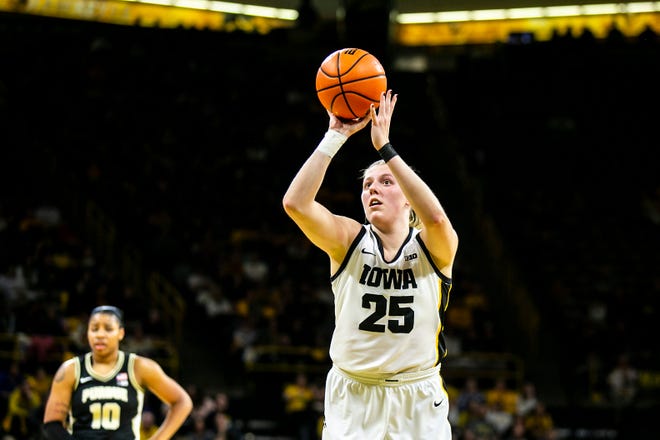 Iowa center Monika Czinano (25) makes a free throw during a NCAA Big Ten Conference women's basketball game against Purdue, Thursday, Dec. 29, 2022, at Carver-Hawkeye Arena in Iowa City, Iowa.