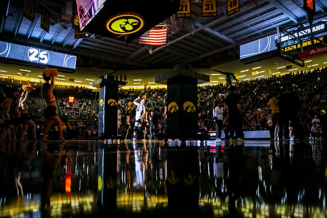 Iowa center Monika Czinano is introduced during a NCAA Big Ten Conference women's basketball game against Purdue, Thursday, Dec. 29, 2022, at Carver-Hawkeye Arena in Iowa City, Iowa.