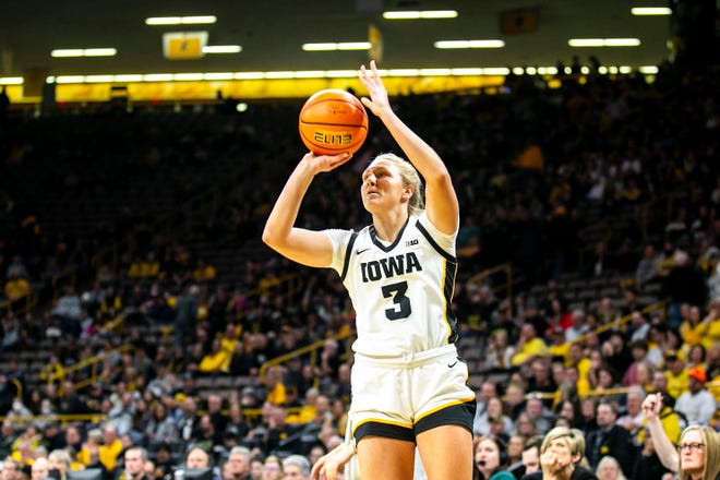 Iowa guard Sydney Affolter (3) makes a 3-point basket during a NCAA Big Ten Conference women's basketball game against Purdue, Thursday, Dec. 29, 2022, at Carver-Hawkeye Arena in Iowa City, Iowa.
