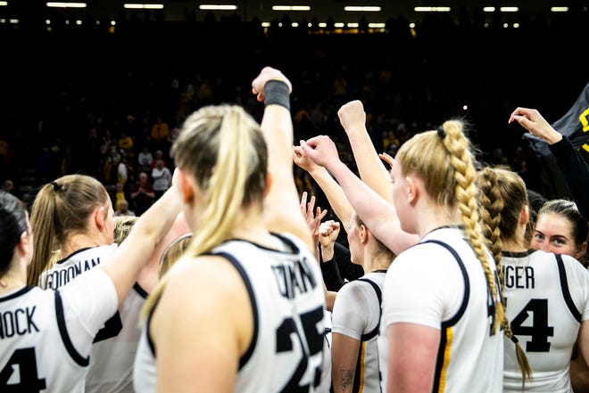 Iowa Hawkeyes players huddle up after a NCAA Big Ten Conference women's basketball game against Northwestern, Wednesday, Jan. 11, 2023, at Carver-Hawkeye Arena in Iowa City, Iowa. Iowa won, 93-64.