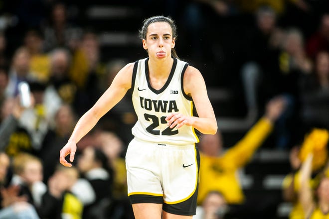 Iowa guard Caitlin Clark (22) reacts after making a 3-point basket during a NCAA Big Ten Conference women's basketball game against Northwestern, Wednesday, Jan. 11, 2023, at Carver-Hawkeye Arena in Iowa City, Iowa.