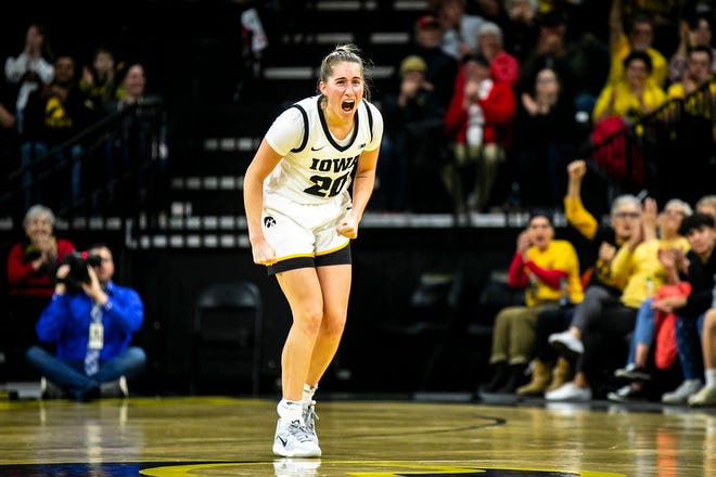 Iowa guard Kate Martin (20) cheers on teammates during a NCAA Big Ten Conference women's basketball game against Northwestern, Wednesday, Jan. 11, 2023, at Carver-Hawkeye Arena in Iowa City, Iowa.