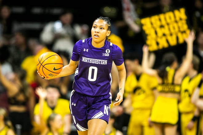 Northwestern guard Kaylah Rainey (0) dribbles during a NCAA Big Ten Conference women's basketball game against Iowa, Wednesday, Jan. 11, 2023, at Carver-Hawkeye Arena in Iowa City, Iowa.