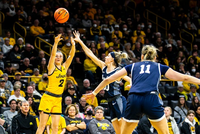 Iowa guard Taylor McCabe (2) shoots a basket as Penn State guard Makenna Marisa defends during a NCAA Big Ten Conference women's basketball game, Saturday, Jan. 14, 2023, at Carver-Hawkeye Arena in Iowa City, Iowa.