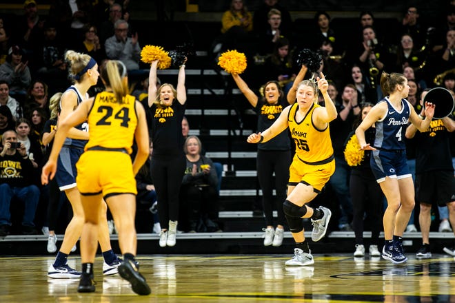Iowa center Monika Czinano (25) reacts after making a basket during a NCAA Big Ten Conference women's basketball game against Penn State, Saturday, Jan. 14, 2023, at Carver-Hawkeye Arena in Iowa City, Iowa.