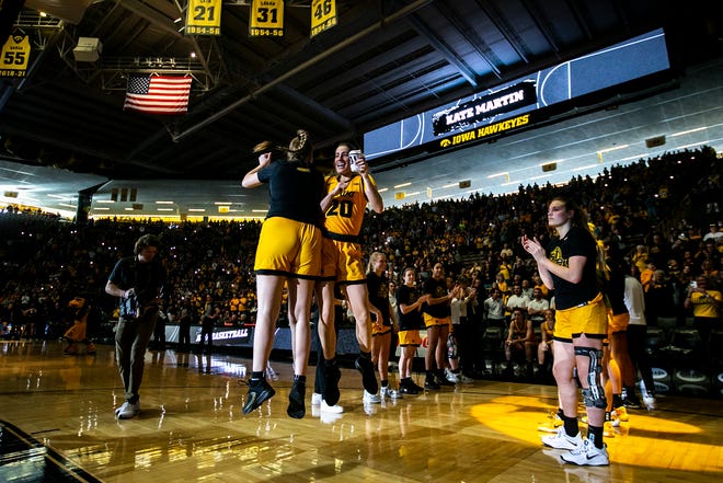 Iowa guard Kate Martin (20) is introduced before a NCAA Big Ten Conference women's basketball game against Penn State, Saturday, Jan. 14, 2023, at Carver-Hawkeye Arena in Iowa City, Iowa.