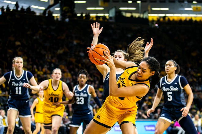 Iowa forward Hannah Stuelke gets fouled by Penn State guard Shay Ciezki during a NCAA Big Ten Conference women's basketball game, Saturday, Jan. 14, 2023, at Carver-Hawkeye Arena in Iowa City, Iowa.