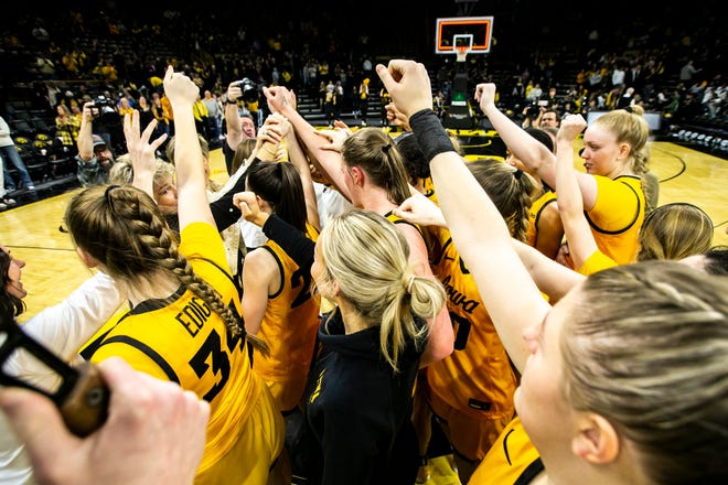 Iowa Hawkeyes players huddle up with Iowa head coach Lisa Bluder after a NCAA Big Ten Conference women's basketball game against Penn State, Saturday, Jan. 14, 2023, at Carver-Hawkeye Arena in Iowa City, Iowa. Iowa won, 108-67.