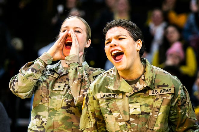 Members of the University of Iowa Army ROTC cheer during a Big Ten Conference men's wrestling dual between Iowa and Nebraska, Friday, Jan. 20, 2023, at Carver-Hawkeye Arena in Iowa City, Iowa.