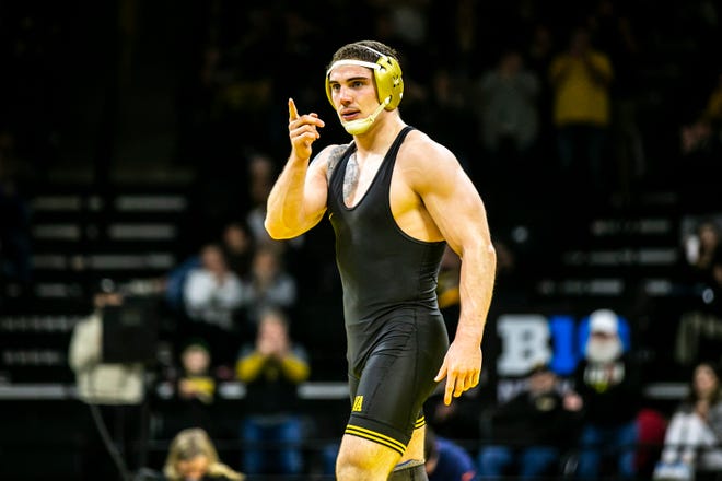 Iowa's Abe Assad reacts after scoring a decision at 184 pounds during a Big Ten Conference men's wrestling dual against Nebraska, Friday, Jan. 20, 2023, at Carver-Hawkeye Arena in Iowa City, Iowa.