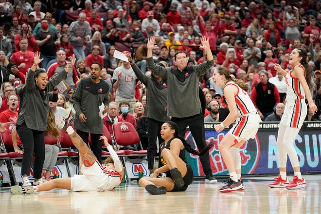 Jan 23, 2023; Columbus, OH, USA;  Ohio State Buckeyes fans and players react. as guard Rikki Harris (1) steals the ball from Iowa Hawkeyes forward Hannah Stuelke (45) during the second half of the NCAA women's basketball game at Value City Arena. Ohio State lost 83-72. Mandatory Credit: Adam Cairns-The Columbus Dispatch