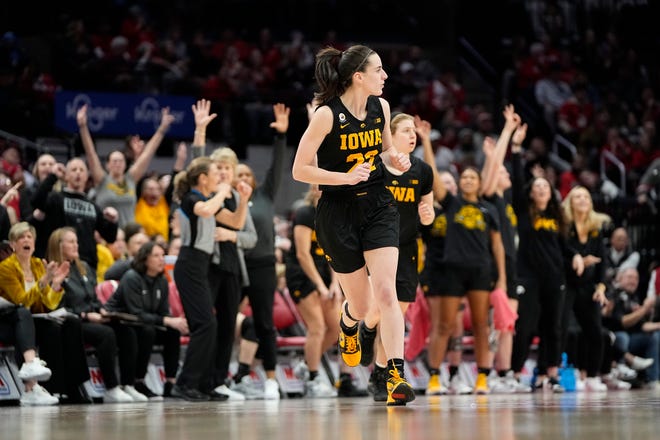 Jan 23, 2023; Columbus, OH, USA;  Iowa Hawkeyes guard Caitlin Clark (22) heads back up court after making a three pointer during the second half of the NCAA women's basketball game against the Ohio State Buckeyes at Value City Arena. Ohio State lost 83-72. Mandatory Credit: Adam Cairns-The Columbus Dispatch