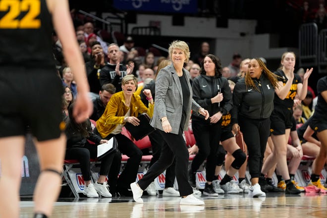 Jan 23, 2023; Columbus, OH, USA;  Iowa Hawkeyes head coach Lisa Bluder smiles from the bench during the second half of the NCAA women's basketball game against the Ohio State Buckeyes at Value City Arena. Ohio State lost 83-72. Mandatory Credit: Adam Cairns-The Columbus Dispatch