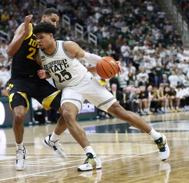 Michigan State forward Malik Hall drives against Iowa forward Kris Murray during the second half of MSU's 63-61 win on Thursday, Jan. 26, 2023, at Breslin Center.