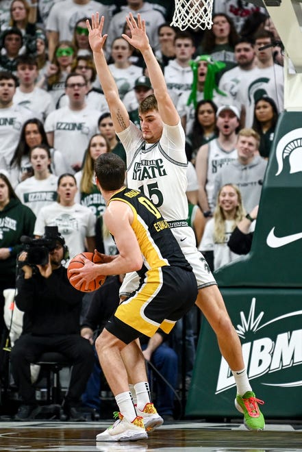 Michigan State's Carson Cooper, right, guards Iowa's Filip Rebraca during the first half on Thursday, Jan. 26, 2023, at the Breslin Center in Lansing.

230126 Msu Iowa Bball 039a