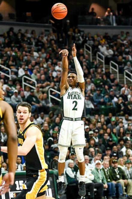 Michigan State's Tyson Walker makes a 3-pointer against Iowa's during the first half on Thursday, Jan. 26, 2023, at the Breslin Center in Lansing.

230126 Msu Iowa Bball 022a