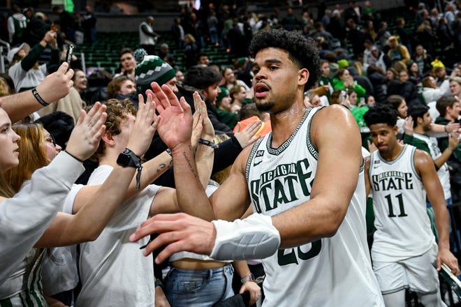 Michigan State's Malik Hall greets fans after beating Iowa on Thursday, Jan. 26, 2023, at the Breslin Center in Lansing.