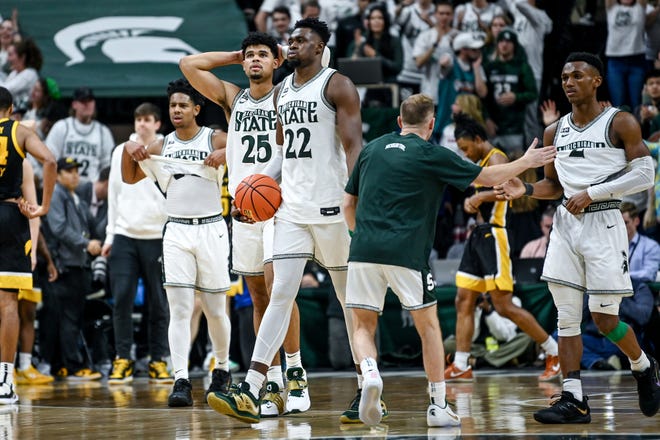 From left, Michigan State's A.J. Hoggard, Malik Hall, Mady Sissoko and Tyson Walker react after a close victory over Iowa on Thursday, Jan. 26, 2023, at the Breslin Center in Lansing.