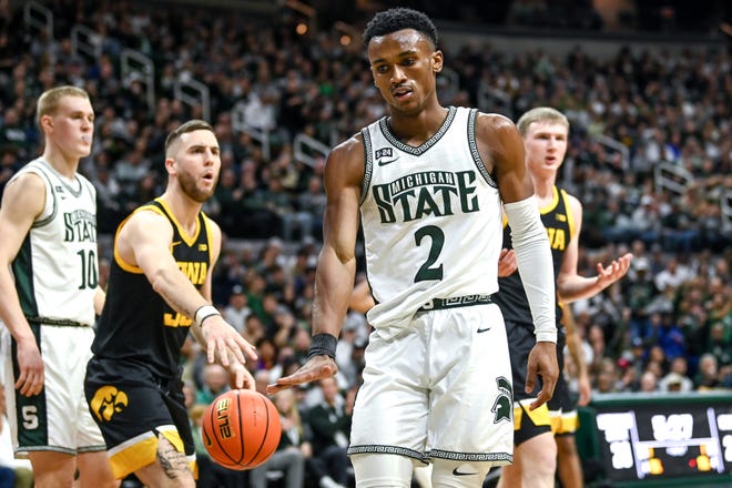 Michigan State's Tyson Walker celebrates after scoring on Iowa's Josh Dix during the first half on Thursday, Jan. 26, 2023, at the Breslin Center in Lansing.