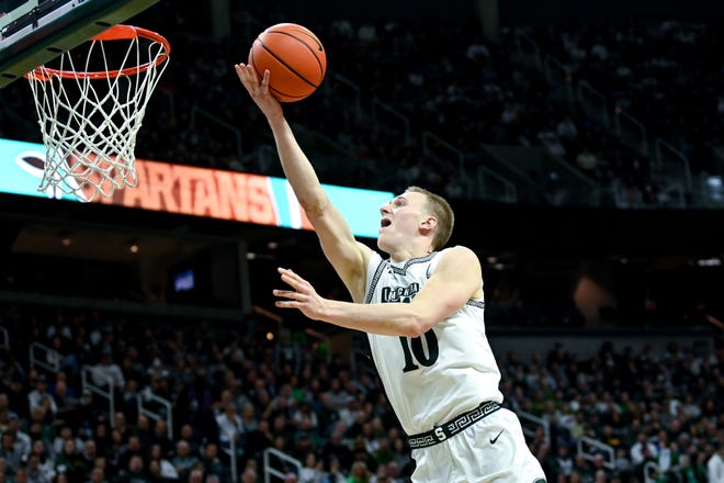 Michigan State's Joey Hauser shoots a layup against Iowa during the first half on Thursday, Jan. 26, 2023, at the Breslin Center in Lansing.